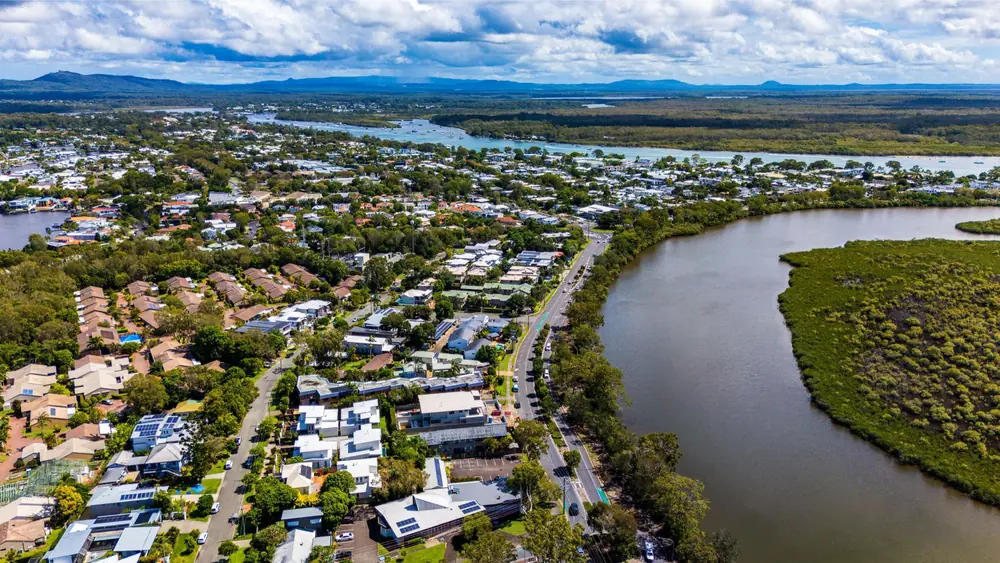 Aerial view across Noosa residential areas and waterways