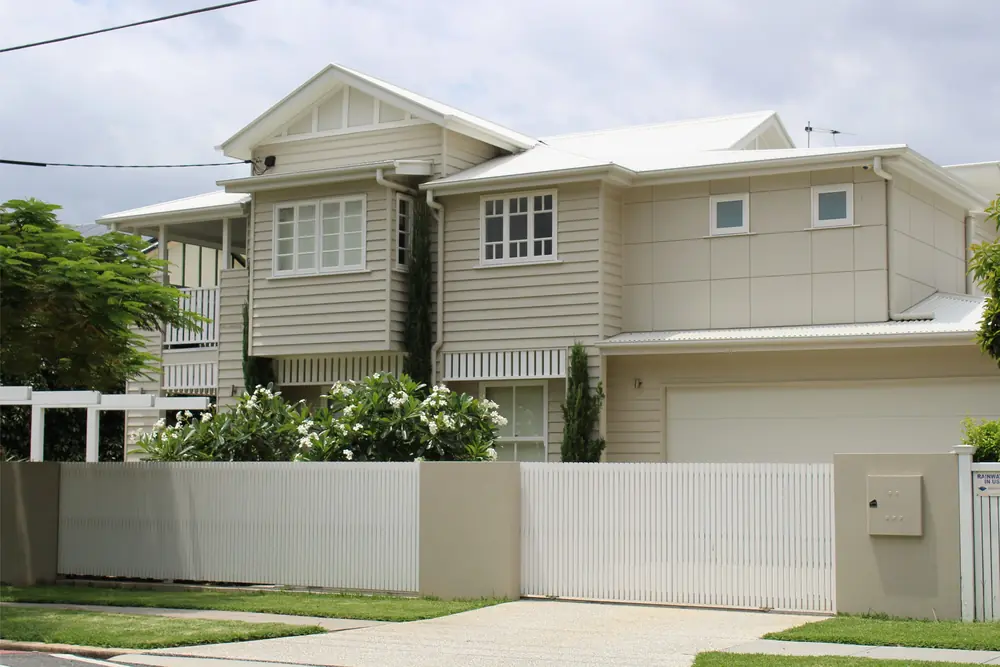 Two-storey residential home with front garden and driveway
